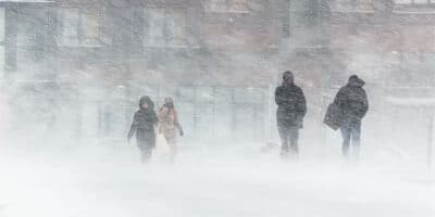 People walking in blizzard conditions