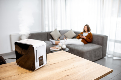 Humidifier running in a lounge room during winter