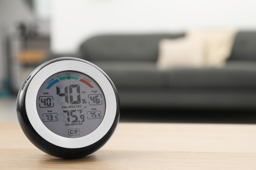 Digital hygrometer measuring the humidity in a room