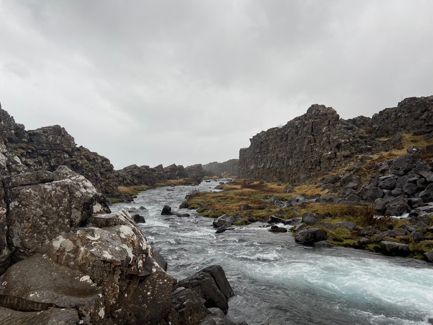 Stratus clouds over a river valley in Þingvellir National Park, Iceland