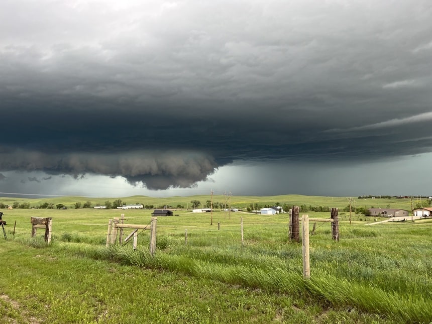 Wall cloud above rolling grasslands near Belle Fourche, South Dakota